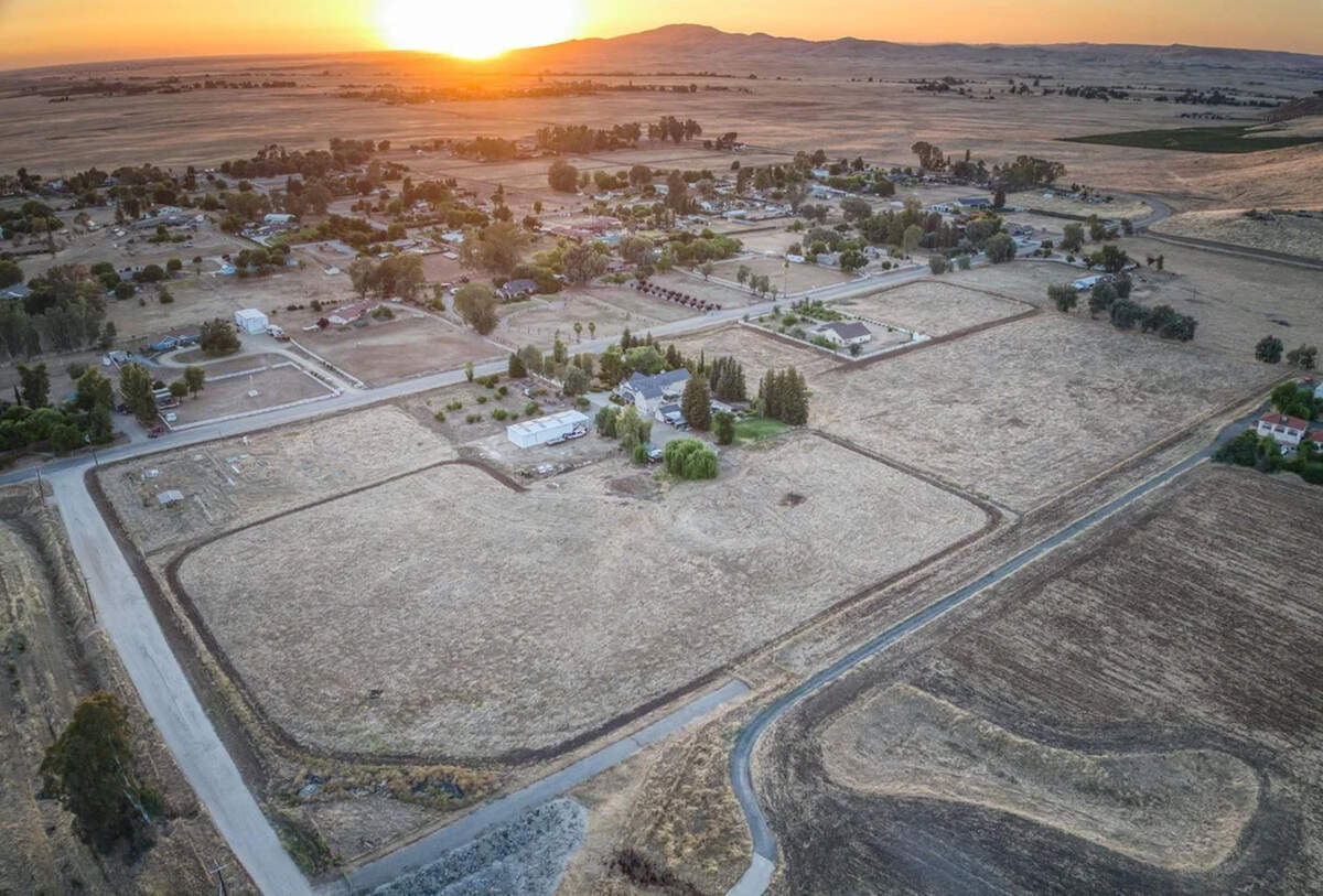 This six-bedroom, five-bath, 6,587 square-foot home in Clovis is listed at $2,250,000. It is described as a European-inspired estate set on expansive acreage with sweeping views of the surrounding countryside and rolling hills.